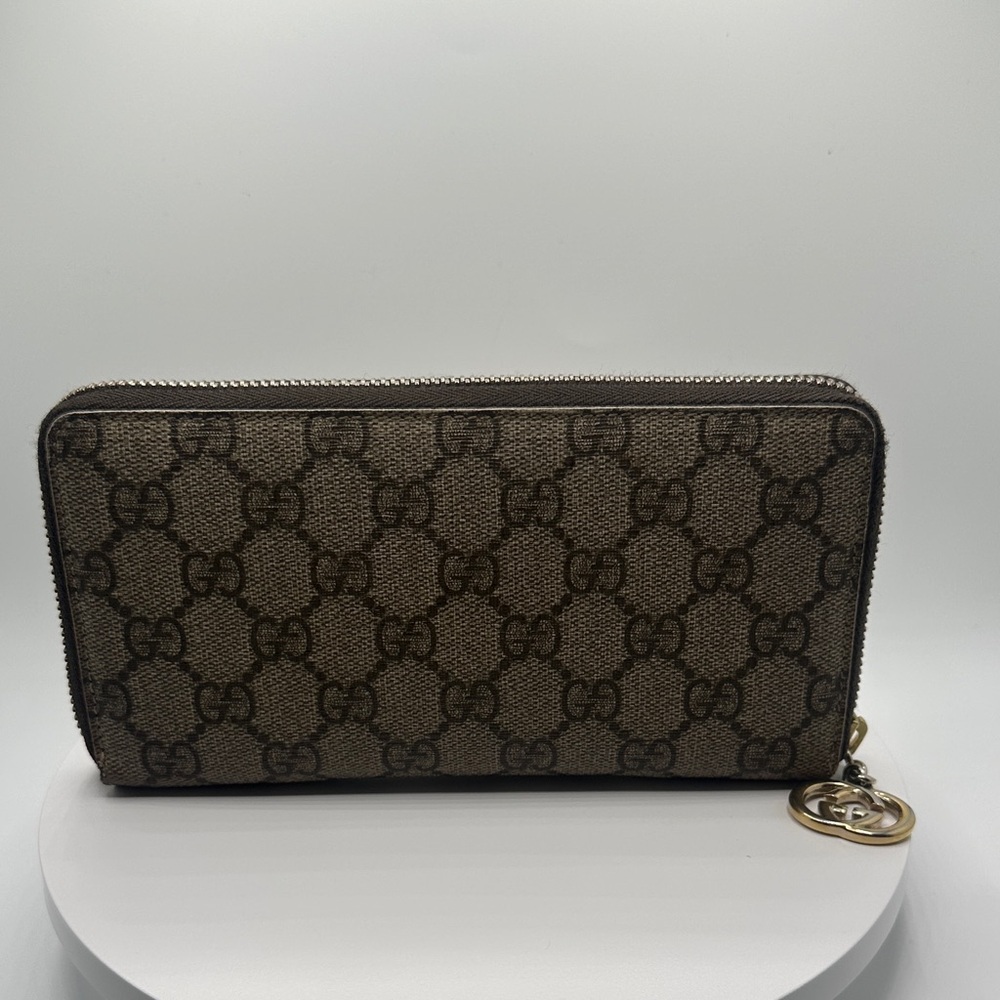Authentic Gucci GG supreme zip around wallet